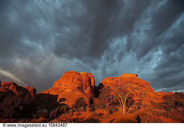 Rock formations and dark clouds in Arches National Park