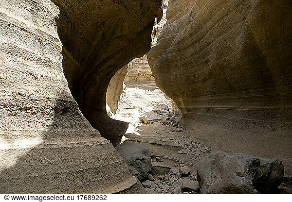 Rock formations in desert area on sunny day  Grand Canary  Barranco De Las Vacas  Spain