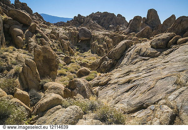 Rock formations in the Alabama Hills with blue sky; California  United States of America