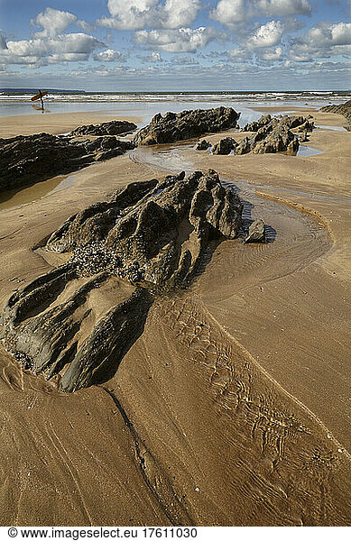Rocks and pools on a beach at low tide  at Saunton Sands  Devon  England  Great Britain.; Saunton Sands  Braunton  Barnstaple  north Devon  southwest England  Great Britain  United Kingdom.