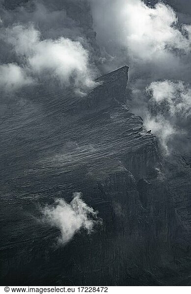 Rocks in fog  mountain landscape with dramatic clouds  Bernese Alps  Bernese Oberland  Switzerland  Europe