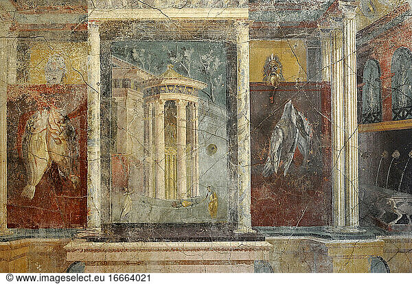 Roman fresco depicting the entrance to a shrine with a tholos on a podium  with a statue of Venus Anadiomena (Venus coming out of the water) to which two women bring offerings of flowers. On both sides  fishes and partridges and  at the top  a theatrical mask and another of a satyr. Cubiculum. North wall. Pompeian House VI. 1st century BC. National Archaeological Museum. Naples. Italy.