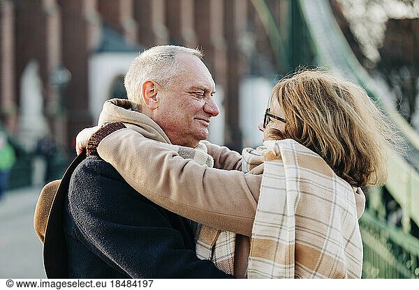 Romantic senior couple embracing each other
