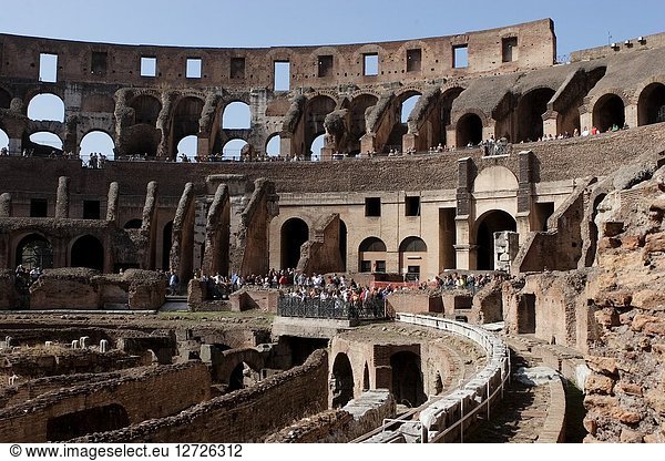 Rome  Italy - October 13  2017: Tourists from around the world visiting one of ancient wonders  the famous Colosseum of Rome in Italy.