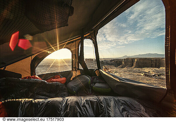 Rooftop tent overlooking desert canyon
