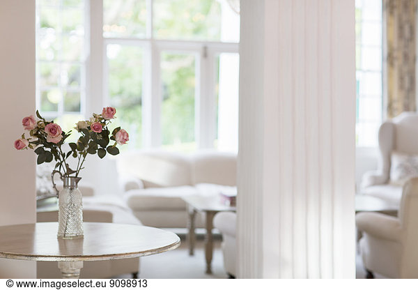 Rose bouquet on table in luxury living room
