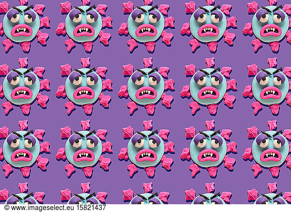 Rows of coronoa viruses with plasticine faces on purple background
