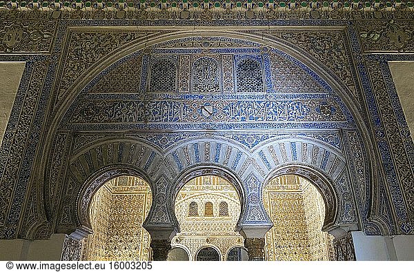Royal Alcazars  Seville  Seville Province  Andalusia  Spain. Decorated arches leading to the Salon de Ambajadores  the Salon of the Ambassadores. The monumental complex formed by the Cathedral  the Alcazar and Archive of the Indies are a UNESCO World Heritages Site.
