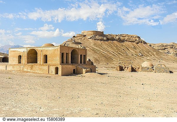 Ruins of ritual buildings in front of Dakhmeh Zoroastrian Tower of Silence  Yazd  Iran  Asia