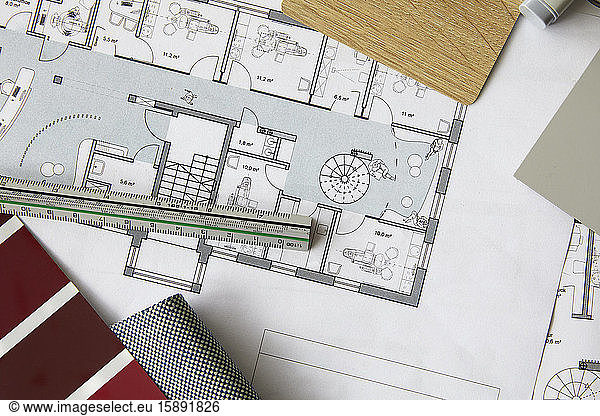 Ruler lying on architectural blueprint
