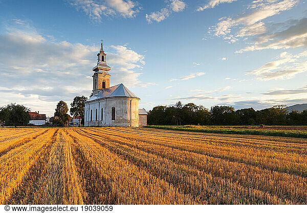 Rural landscape with a church in Turiec region  central Slovakia.
