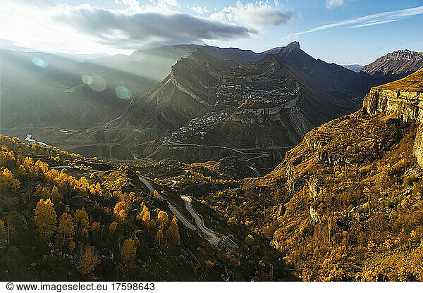 Russia  Dagestan  Gunib  Brown autumn valley in front of Mount Gunib at sunsetÂ 