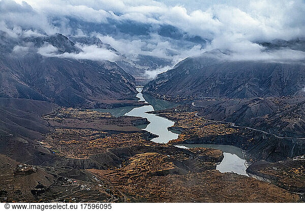 Russia  Dagestan  Gunib  Low clouds over mountain reservoir in autumn