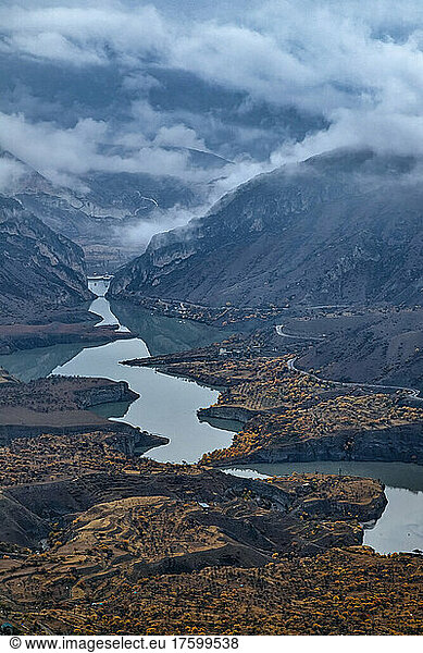 Russia  Dagestan  Gunib  Low clouds over mountain reservoir in autumn