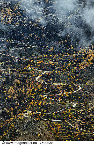 Russia  Dagestan  Gunib  Winding mountain road in autumn