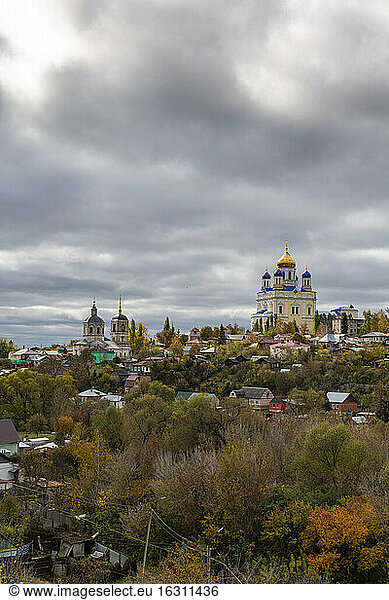 Russia  Lipetsk Oblast  Yelets  Cloudy sky over Yelets Cathedral and surrounding houses