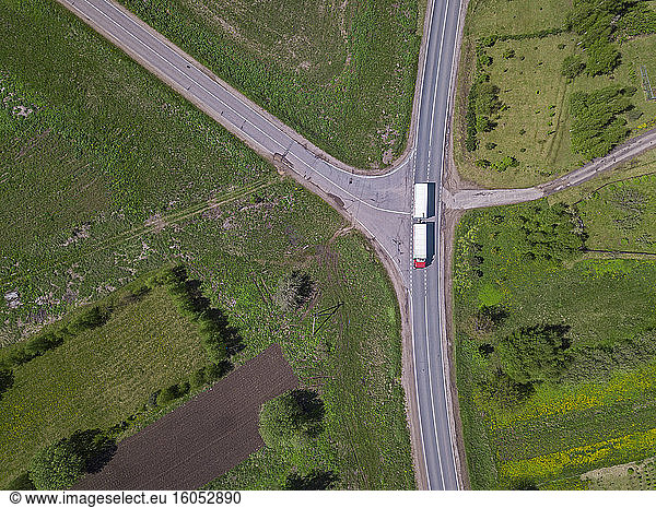 Russia  Moscow Oblast  Aerial view of truck driving past intersection on country road
