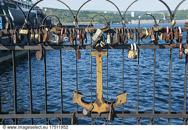 Russia  Murmansk  Love locks and anchor on bridge