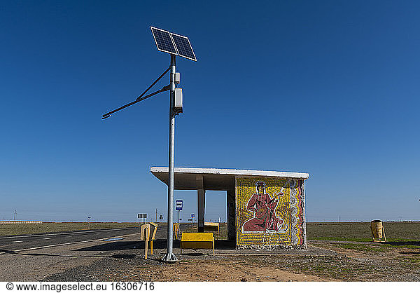 Russia  Republic of Kalmykia  Solar panels in front of remote bus stop