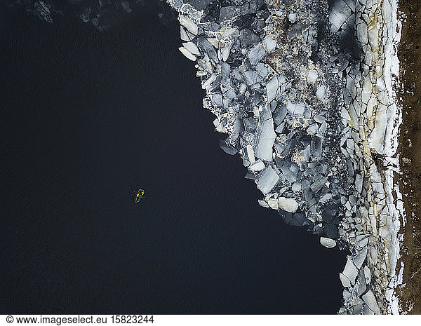 Russia  Saint Petersburg  Sestroretsk  Aerial view of lone boat leaving icy shore of Gulf of Finland