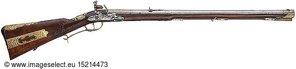 RUSSLAND ZARENREICH  Luxus-SteinschlossbÃ¼chse aus einer kaiserlich russischen Gewehrkammer Marcus Zelner in Wien um 1720. Achtkantiger  mittig leicht eingezogener Damastlauf mit siebenfach gezogener Seele im Kaliber 15 mm. Eingeschobene Messingvisierung. MÃ¼ndung und Laufansatz reich mit goldenem Banddekor (Einlagen stellenweise unvollstÃ¤ndig)eingelegt. Ãœber der Kammer signiert 'Marcus Zelner'. Fein graviertes Steinschloss mit jagdlicher Szene und wiederholter Signatur 'Marcus Zelner in Wien'. SchÃ¶n verschnittene VollschÃ¤ftung aus Nussbaumholz (kleine Reparatur am Kolben) mit reich profilierter  feuervergoldeter Garnitur mit jagdlichen Szenen zwischen Rankendekor. Der AbzugsbÃ¼gel mit abnehmbarer Handauflage. Auf der Wange eingelegte Windrose in Bein und Ebenholz  Kolben mit Schuber. Daumenplatte aus feuervergoldetem Silber in Form des russischen Doppeladlers. HÃ¶lzerner Ladestock mit Messingdopper. LÃ¤nge 110 5 cm. Marcus Zelner  1693 - 1758  tÃ¤tig in Salzburg und Wien. Der Ãœberlieferung nach stammt die BÃ¼chse aus der Sammlung des Schwiegersohns des FÃ¼rsten Alexander Sachovskoy  Generalmajor Graf Keller aus St. Petersburg. Die BestÃ¤nde der Sammlung wurden 1920 in Schweden versteigert. In der RÃ¼stkammer in Stockholm befindet sich eine BÃ¼chse von I.G. Kolbe aus der Sammlung von FÃ¼rst Alexander Sachovskoy und Graf Keller aus St. Petersburg um 1740 mit sehr Ã¤hnlichem russischem Doppeladler  bei dem St. Georg ebenfalls nach links schaut. Vgl. 'European Firearms in Swedish Castles'  von Kaa Wennberg  Uddevalla 1986  S. 1 und 74. Sehr seltenes  frÃ¼hes Gewehr in musealer QualitÃ¤t.