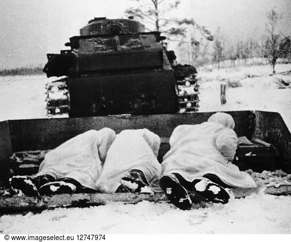 RUSSO-FINNISH WAR  1939-40. Soviet infantrymen being taken into battle on a sled drawn by an armored tank  1939-40.