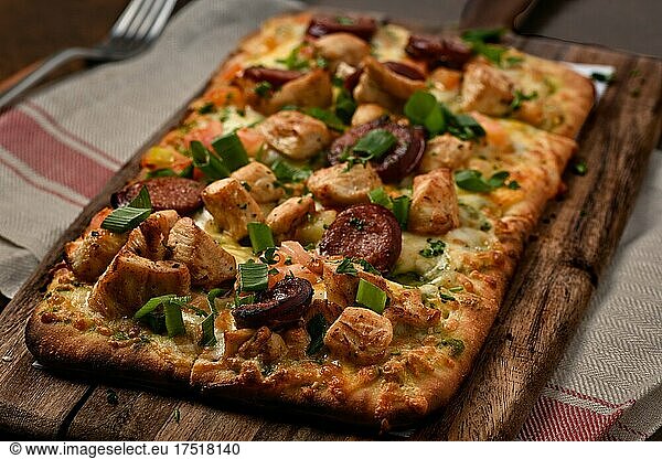 Rustic Pizza over a pice of wood
