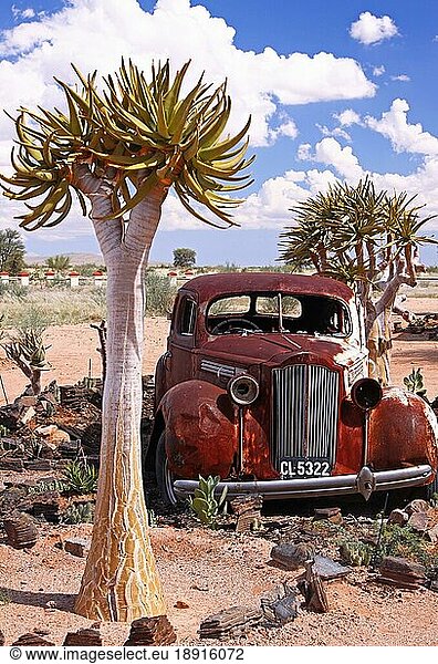 Rusty classic car on the road