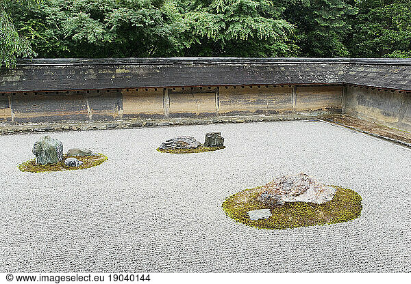 Ryoan-ji  The Temple of the Peaceful Dragon  is a Zen temple with the famous karesansui (dry landscape) rock garden  Kyoto  Japan.