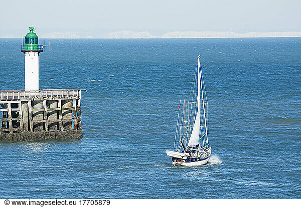 Sailboat Sailing By The Lighthouse; Calais  France