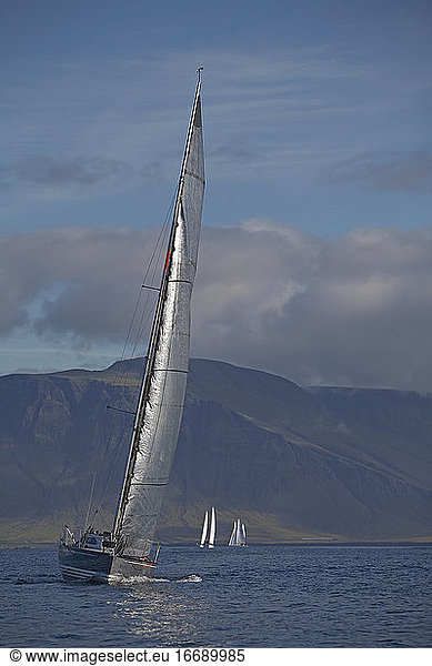 Sailboat tipping in wind close to Reykjavik