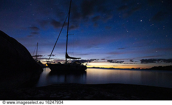 Sailing boat at dusk