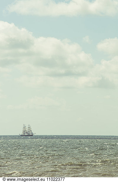 Sailing ship at horizon