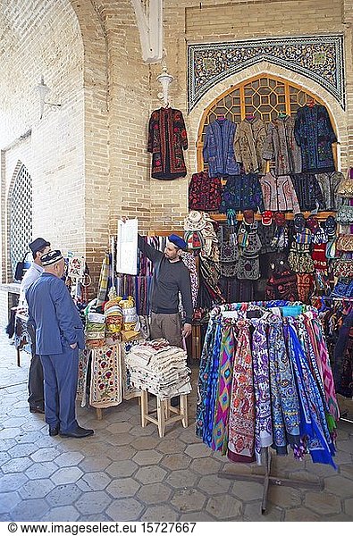 Sale of clothes in Toqi Zargaron Dome Bazaar  Old Town  Bukhara  Buxoro Province  Uzbekistan  Asia