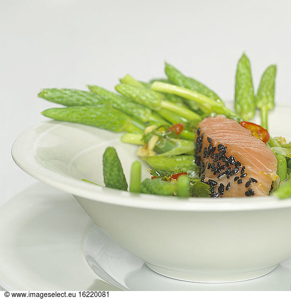 Salmon steak with green asparagus  close-up