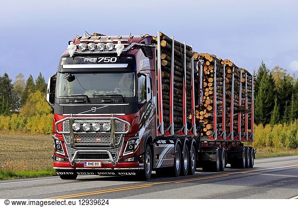 Salo  Finland. September 28  2018: Customized Volvo FH16 750 logging truck of R. M. Enberg Transport Ab hauls a log load along highway in autumn.