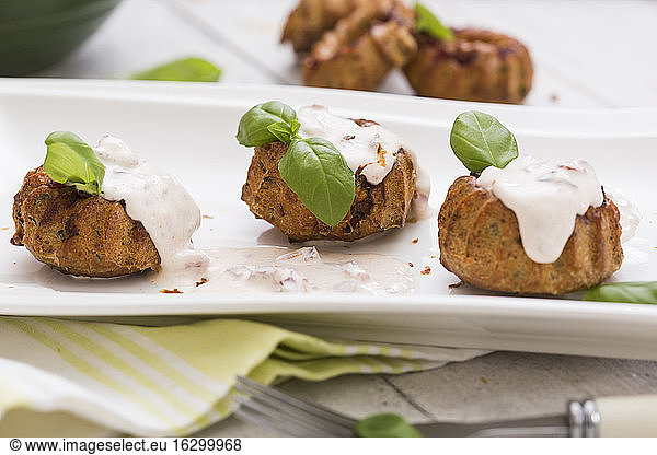 Salty ring cakes on serving plate studio shot