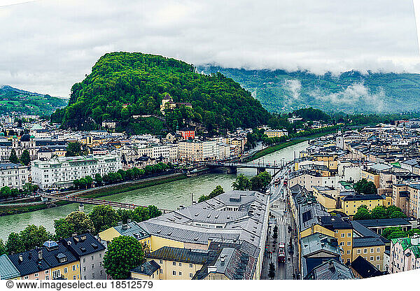 Salzburg Panorama on a gloomy and misty day. Austrian alps regio