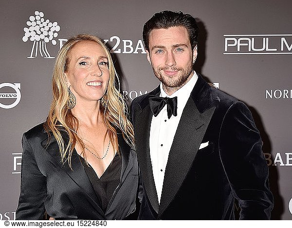 Sam Taylor-Johnson (L) and Aaron Taylor-Johnson arrive at the The 2018 Baby2Baby Gala Presented By Paul Mitchell Event at 3LABS on November 10  2018 in Culver City  California.