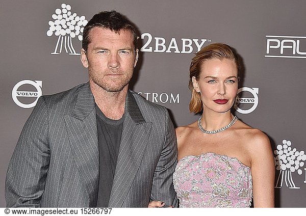 Sam Worthington and Lara Bingle Worthington arrive at the The 2018 Baby2Baby Gala Presented By Paul Mitchell Event at 3LABS on November 10  2018 in Culver City  California.