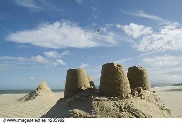 Sand castles under blue sky