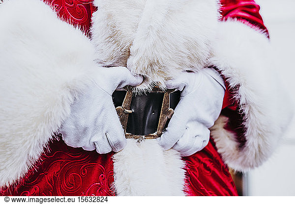 Santa Claus hands in belt
