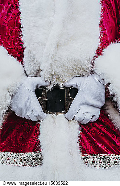 Santa Claus hands in belt