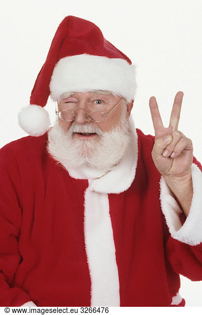 Santa Claus making peace sign  portrait