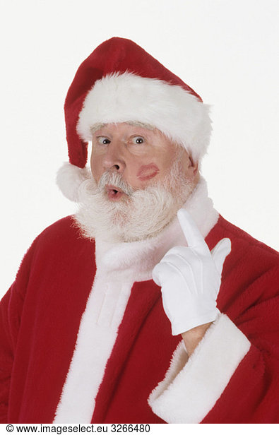 Santa Claus with lipstick on cheek  portrait  close-up
