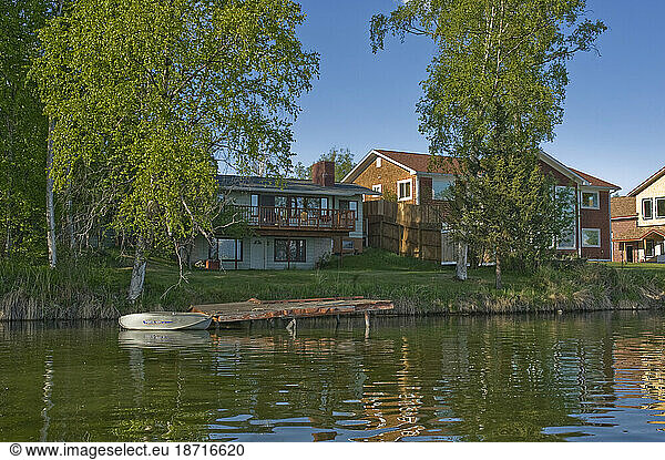 Sarah Palin's home (right) and the summer home of author Joe McGinnis (left) on the shore of Lake Lucille in Wasilla  Alaska