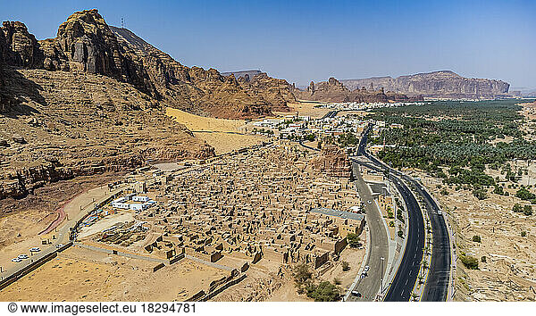 Saudi Arabia  Al-Ula  Aerial view of desert old town with oasis in background
