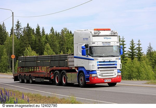 Scania R620 semi trailer of Eero Vilpas hauls a load of structural steel along Highway 4 in summer in Hirvaskangas  Finland - June 14  2018.