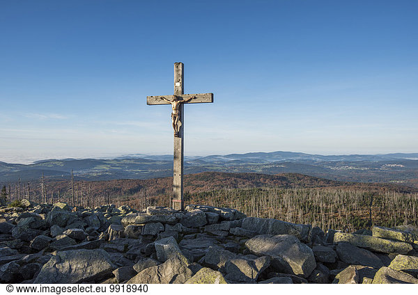 Scenic view of a mountain top (Lusen) with crucifix cross at summit  Bavarian Forest National Park  Bavaria  Germany