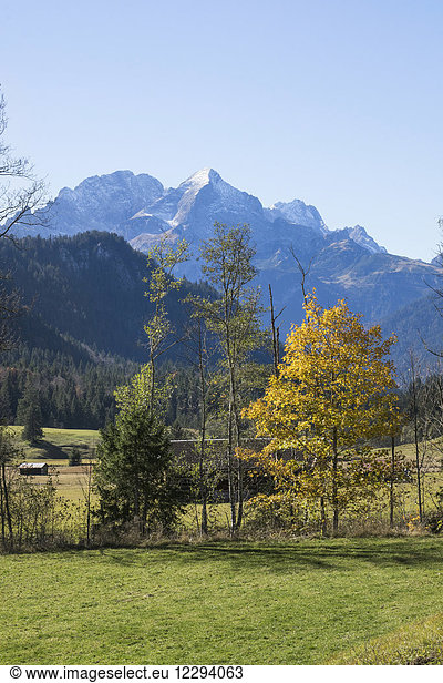 Scenic view of autumn landscape and snowcapped mountain in Bavarian alps  Alpspitz  Wetterstein Mountain